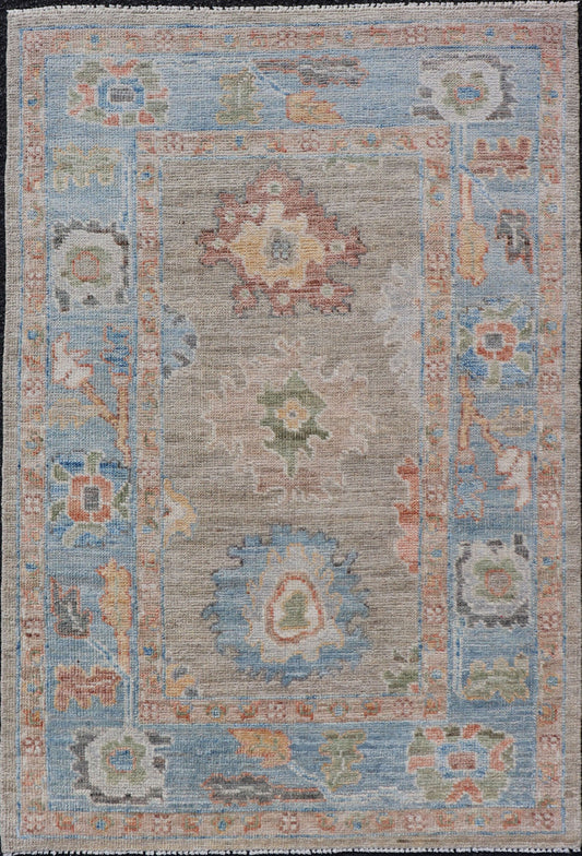 Measures: 2'7 x 4'0 Modern Floral Oushak With Sandy - Brown Background and A Sky Blue Border. Keivan Woven Arts; rug AWR - 12378 Country of Origin: Afghanistan Type: Oushak Design: Floral, Arabesque, All - Over. This piece gives a modern vibrancy... - Keivan Woven ArtsAWR - 12378 - 23258