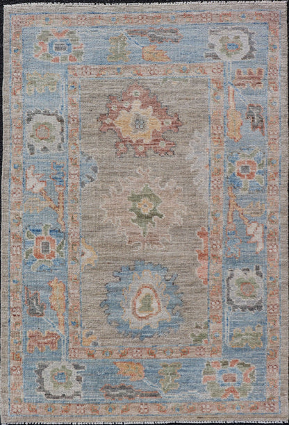 Measures: 2'7 x 4'0 Modern Floral Oushak With Sandy - Brown Background and A Sky Blue Border. Keivan Woven Arts; rug AWR - 12378 Country of Origin: Afghanistan Type: Oushak Design: Floral, Arabesque, All - Over. This piece gives a modern vibrancy... - Keivan Woven ArtsAWR - 12378 - 23258Rug