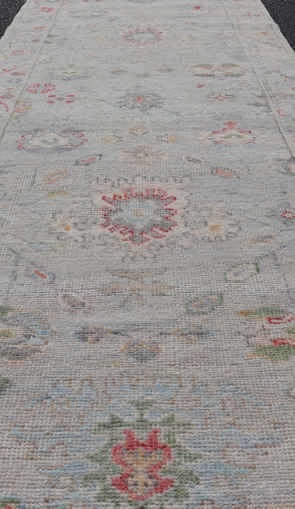 Measures: 2'6 x 7'10 Modern Oushak Runner with Floral Motifs in Warm Green, Yellow, and Red. Keivan Woven Arts; rug AWR - 12462 Country of Origin: Afghanistan Type: Oushak Circa 2020 - . Color tones such as cream, taupe, light blue, light green, ora... - Keivan Woven ArtsAWR - 12462 - 23288Rug