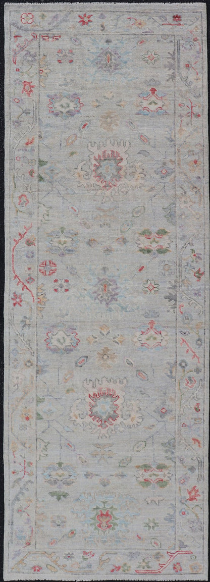 Measures: 2'6 x 7'10 Modern Oushak Runner with Floral Motifs in Warm Green, Yellow, and Red. Keivan Woven Arts; rug AWR - 12462 Country of Origin: Afghanistan Type: Oushak Circa 2020 - . Color tones such as cream, taupe, light blue, light green, ora... - Keivan Woven ArtsAWR - 12462 - 23288Rug