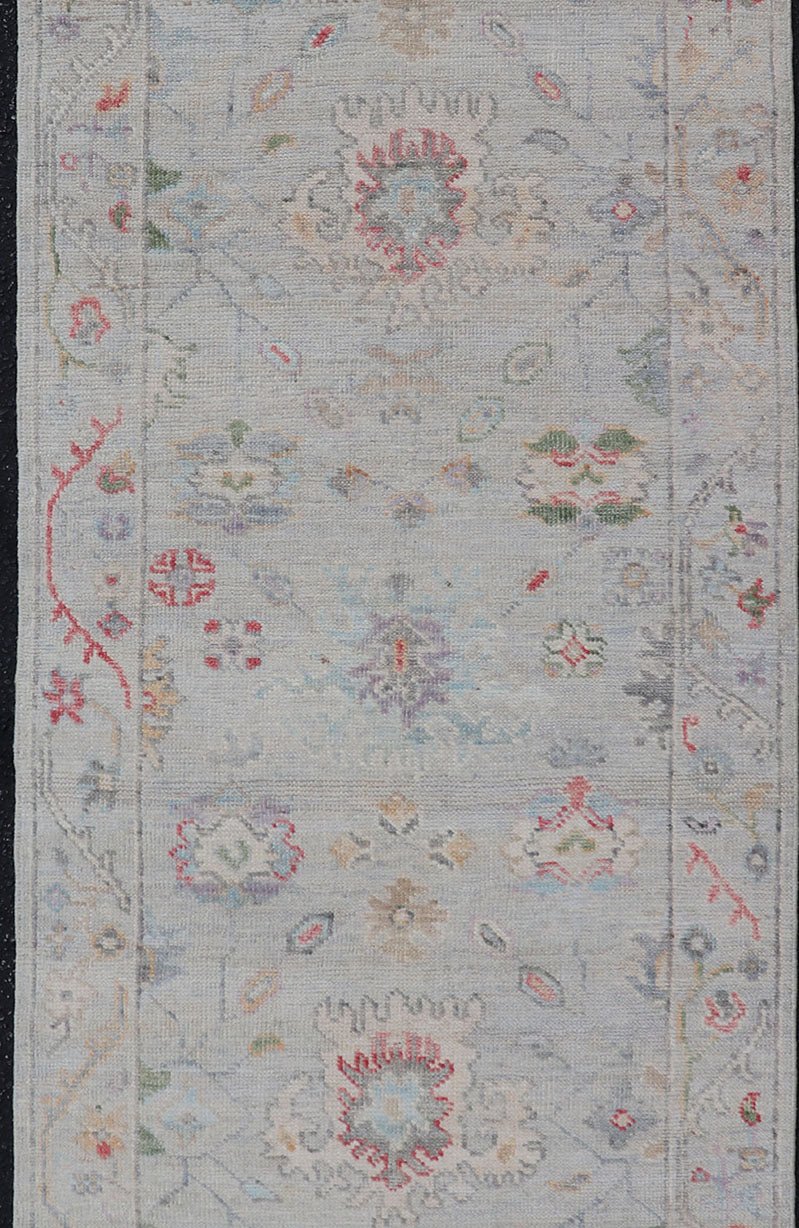 Measures: 2'6 x 7'10 Modern Oushak Runner with Floral Motifs in Warm Green, Yellow, and Red. Keivan Woven Arts; rug AWR - 12462 Country of Origin: Afghanistan Type: Oushak Circa 2020 - . Color tones such as cream, taupe, light blue, light green, ora... - Keivan Woven ArtsAWR - 12462 - 23288Rug