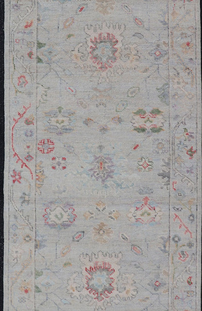 Measures: 2'6 x 7'10 Modern Oushak Runner with Floral Motifs in Warm Green, Yellow, and Red. Keivan Woven Arts; rug AWR - 12462 Country of Origin: Afghanistan Type: Oushak Circa 2020 - . Color tones such as cream, taupe, light blue, light green, ora... - Keivan Woven ArtsAWR - 12462 - 23288Rug