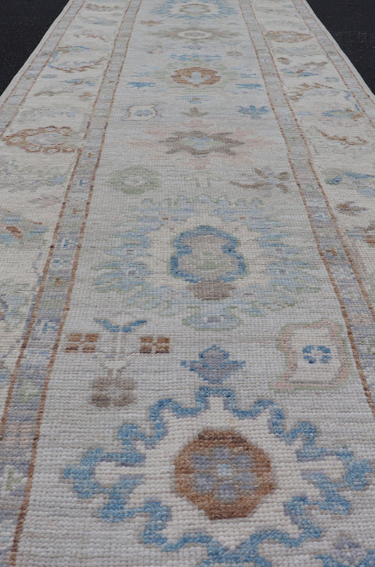 Measures: 3'1 x 12'3 Modern Oushak Runner on Light Cream Field and Colorful Motifs Of Blue & Green. Keivan Woven Arts; rug AWR - 12500 Country of Origin: Afghanistan Type: Oushak Design: Floral, All - Over Floral 21st Century This Oushak runner... - Keivan Woven ArtsAWR - 12500 - 23300Rug