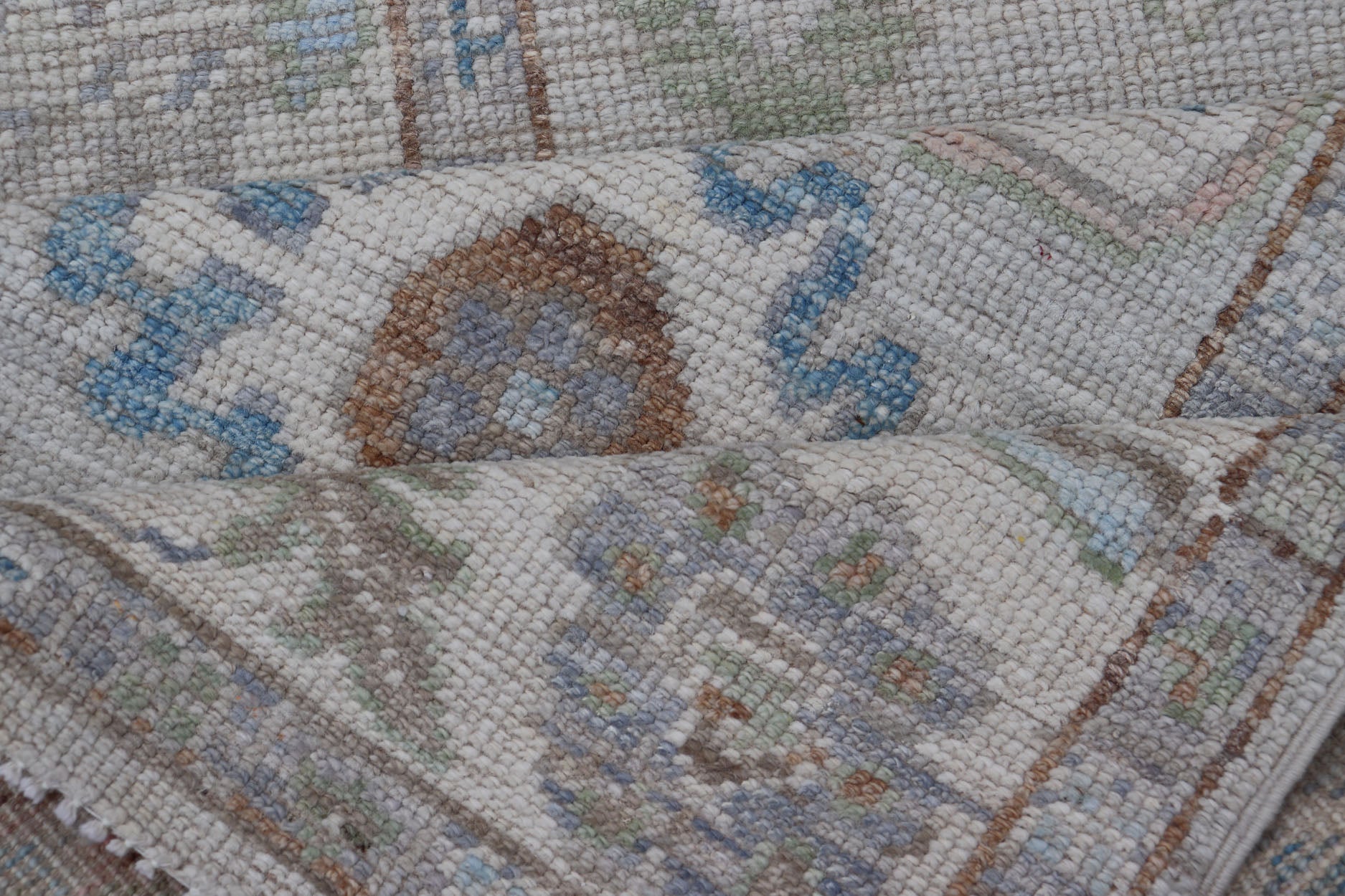 Measures: 3'1 x 12'3 Modern Oushak Runner on Light Cream Field and Colorful Motifs Of Blue & Green. Keivan Woven Arts; rug AWR - 12500 Country of Origin: Afghanistan Type: Oushak Design: Floral, All - Over Floral 21st Century This Oushak runner... - Keivan Woven ArtsAWR - 12500 - 23300Rug