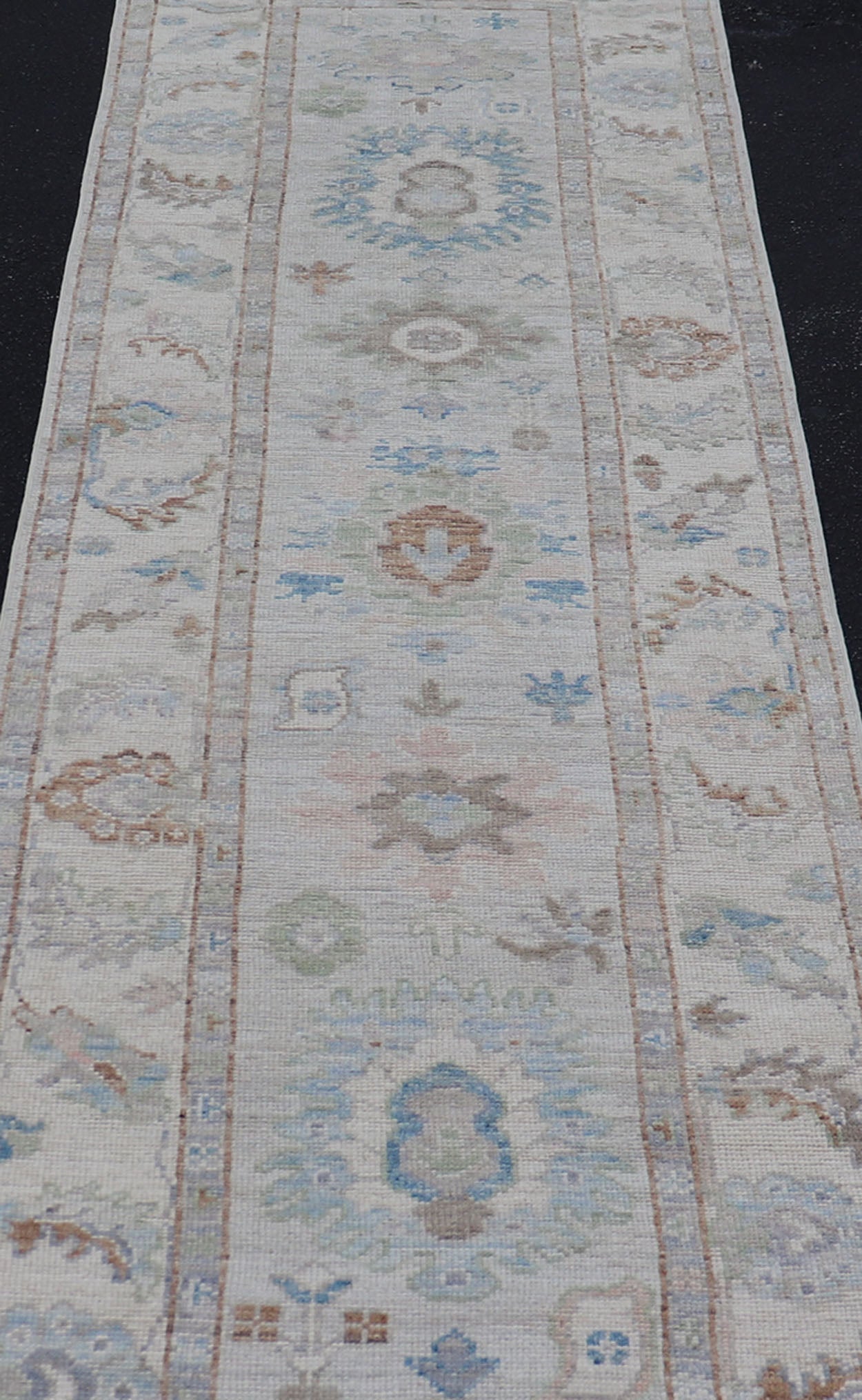 Measures: 3'1 x 12'3 Modern Oushak Runner on Light Cream Field and Colorful Motifs Of Blue & Green. Keivan Woven Arts; rug AWR - 12500 Country of Origin: Afghanistan Type: Oushak Design: Floral, All - Over Floral 21st Century This Oushak runner... - Keivan Woven ArtsAWR - 12500 - 23300Rug