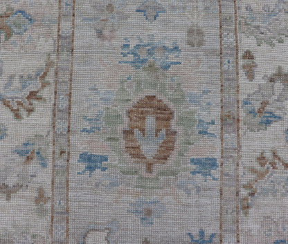 Measures: 3'1 x 12'3 Modern Oushak Runner on Light Cream Field and Colorful Motifs Of Blue & Green. Keivan Woven Arts; rug AWR - 12500 Country of Origin: Afghanistan Type: Oushak Design: Floral, All - Over Floral 21st Century This Oushak runner... - Keivan Woven ArtsAWR - 12500 - 23300Rug