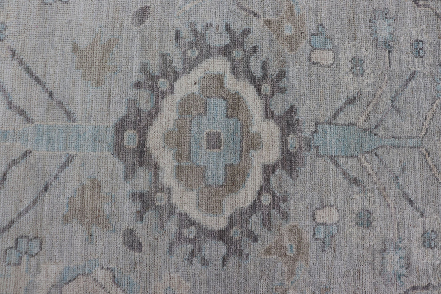 Measures: 13'4 x 19'3 Large Modern Oushak Design in Light Blue, Grey, with Light Cream Background. Keivan Woven Arts; rug AWR - 12521 Country of Origin: Afghanistan Type: Oushak Design: All - Over, Floral. This rustic piece holds charm within a powd... - Keivan Woven ArtsAWR - 12521 - 23402Rug