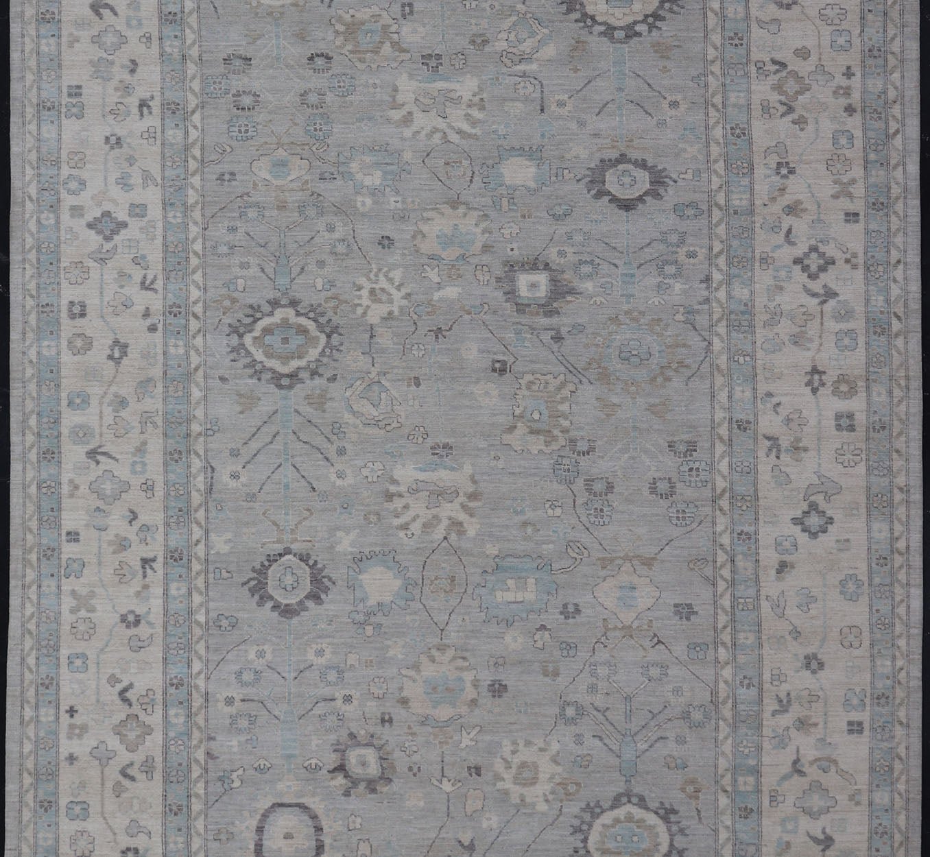 Measures: 13'4 x 19'3 Large Modern Oushak Design in Light Blue, Grey, with Light Cream Background. Keivan Woven Arts; rug AWR - 12521 Country of Origin: Afghanistan Type: Oushak Design: All - Over, Floral. This rustic piece holds charm within a powd... - Keivan Woven ArtsAWR - 12521 - 23402