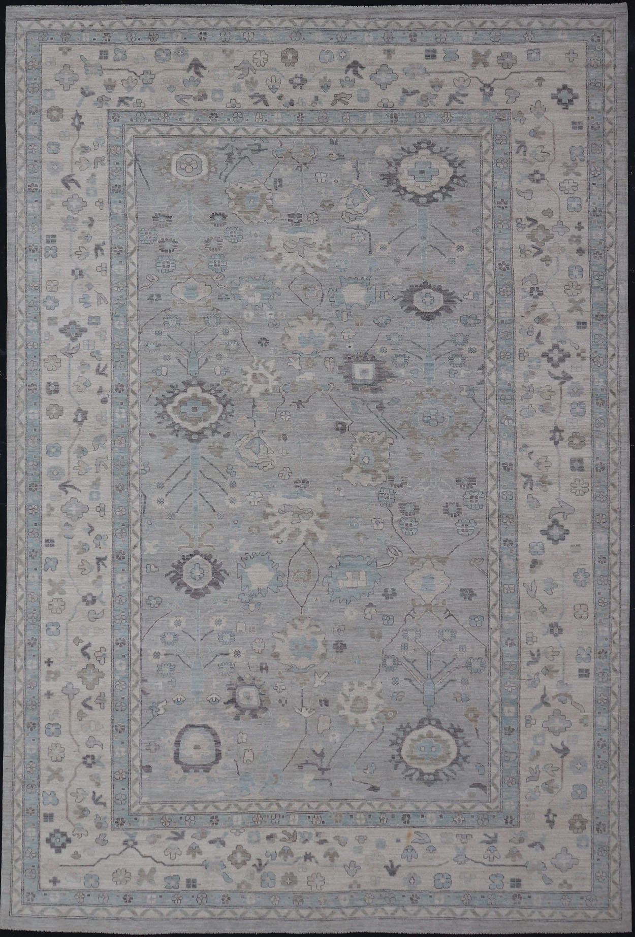 Measures: 13'4 x 19'3 Large Modern Oushak Design in Light Blue, Grey, with Light Cream Background. Keivan Woven Arts; rug AWR - 12521 Country of Origin: Afghanistan Type: Oushak Design: All - Over, Floral. This rustic piece holds charm within a powd... - Keivan Woven ArtsAWR - 12521 - 23402