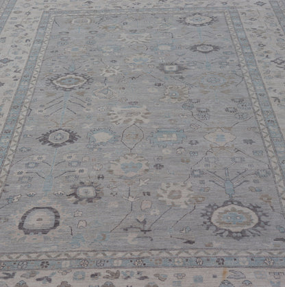 Measures: 13'4 x 19'3 Large Modern Oushak Design in Light Blue, Grey, with Light Cream Background. Keivan Woven Arts; rug AWR - 12521 Country of Origin: Afghanistan Type: Oushak Design: All - Over, Floral. This rustic piece holds charm within a powd... - Keivan Woven ArtsAWR - 12521 - 23402