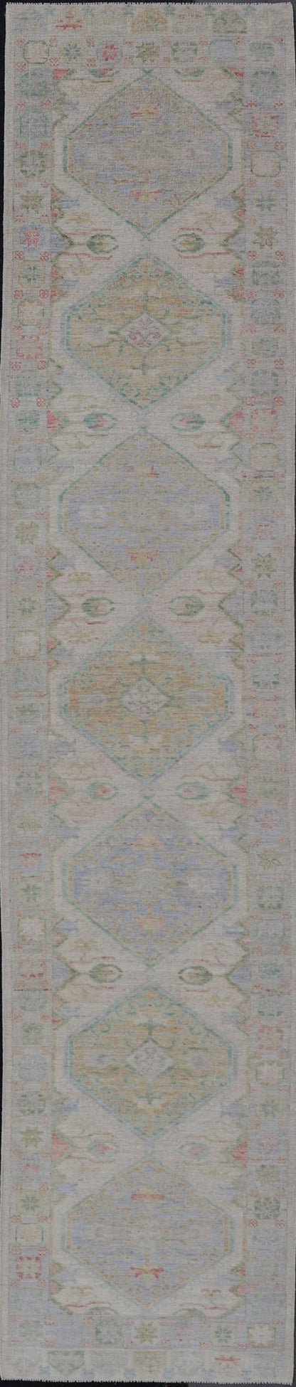 Measures: 3'2 x 16'6 Modern Oushak Runner Design In Cream Background and All - Over Design. Keivan Woven Arts; rug AWR - 12595 Country of Origin: Afghanistan Type: Oushak Design: Floral, All - Over This Oushak designed runner features a classic O... - Keivan Woven ArtsAWR - 12595 - 23312