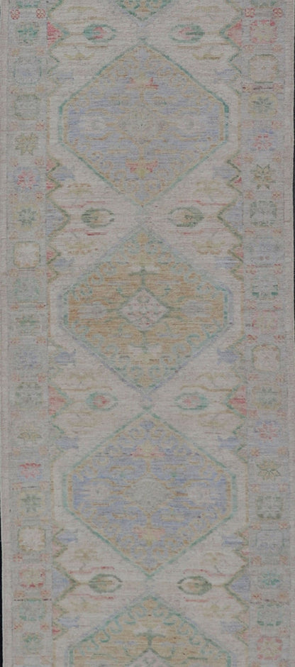 Measures: 3'2 x 16'6 Modern Oushak Runner Design In Cream Background and All - Over Design. Keivan Woven Arts; rug AWR - 12595 Country of Origin: Afghanistan Type: Oushak Design: Floral, All - Over This Oushak designed runner features a classic O... - Keivan Woven ArtsAWR - 12595 - 23312
