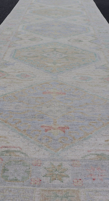 Measures: 3'2 x 16'6 Modern Oushak Runner Design In Cream Background and All - Over Design. Keivan Woven Arts; rug AWR - 12595 Country of Origin: Afghanistan Type: Oushak Design: Floral, All - Over This Oushak designed runner features a classic O... - Keivan Woven ArtsAWR - 12595 - 23312