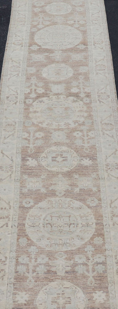 Measures: 2'9 x 14'4 Khotan Design Runner with All - Over Geometric - Circle Medallion Pattern. AWR - 12602 / rug/AWR - 12602 country of origin / type: Afghanistan / Khotan This Khotan features a geometric all - over circle design flanked by a repeati... - Keivan Woven ArtsAWR - 12602 - 23324