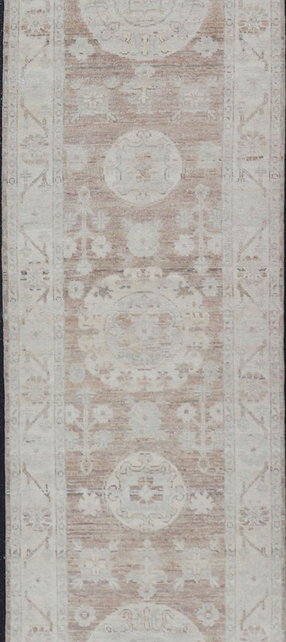 Measures: 2'9 x 14'4 Khotan Design Runner with All - Over Geometric - Circle Medallion Pattern. AWR - 12602 / rug/AWR - 12602 country of origin / type: Afghanistan / Khotan This Khotan features a geometric all - over circle design flanked by a repeati... - Keivan Woven ArtsAWR - 12602 - 23324