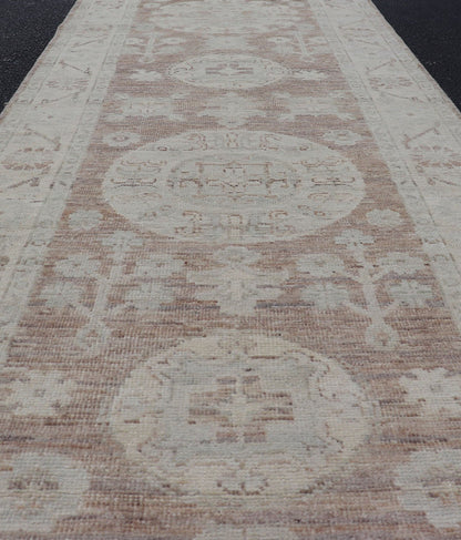 Measures: 2'9 x 14'4 Khotan Design Runner with All - Over Geometric - Circle Medallion Pattern. AWR - 12602 / rug/AWR - 12602 country of origin / type: Afghanistan / Khotan This Khotan features a geometric all - over circle design flanked by a repeati... - Keivan Woven ArtsAWR - 12602 - 23324