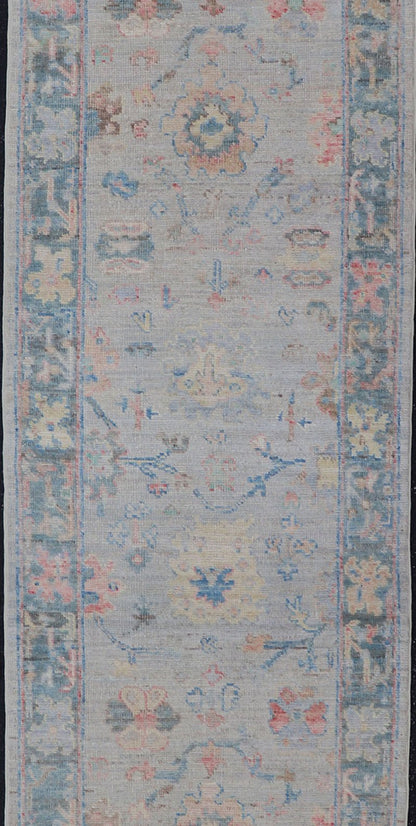 Measures: 2'5 x 9'10 Hand - Knotted Modern Oushak Runner on Light Gray Field and Colorful Motifs. Keivan Woven Arts; rug AWR - 12648 Country of Origin: Afghanistan Type: Oushak Design: Floral, All - Over, Arabesque 21st Century This Oushak runner... - Keivan Woven ArtsAWR - 12648 - 23348Rug
