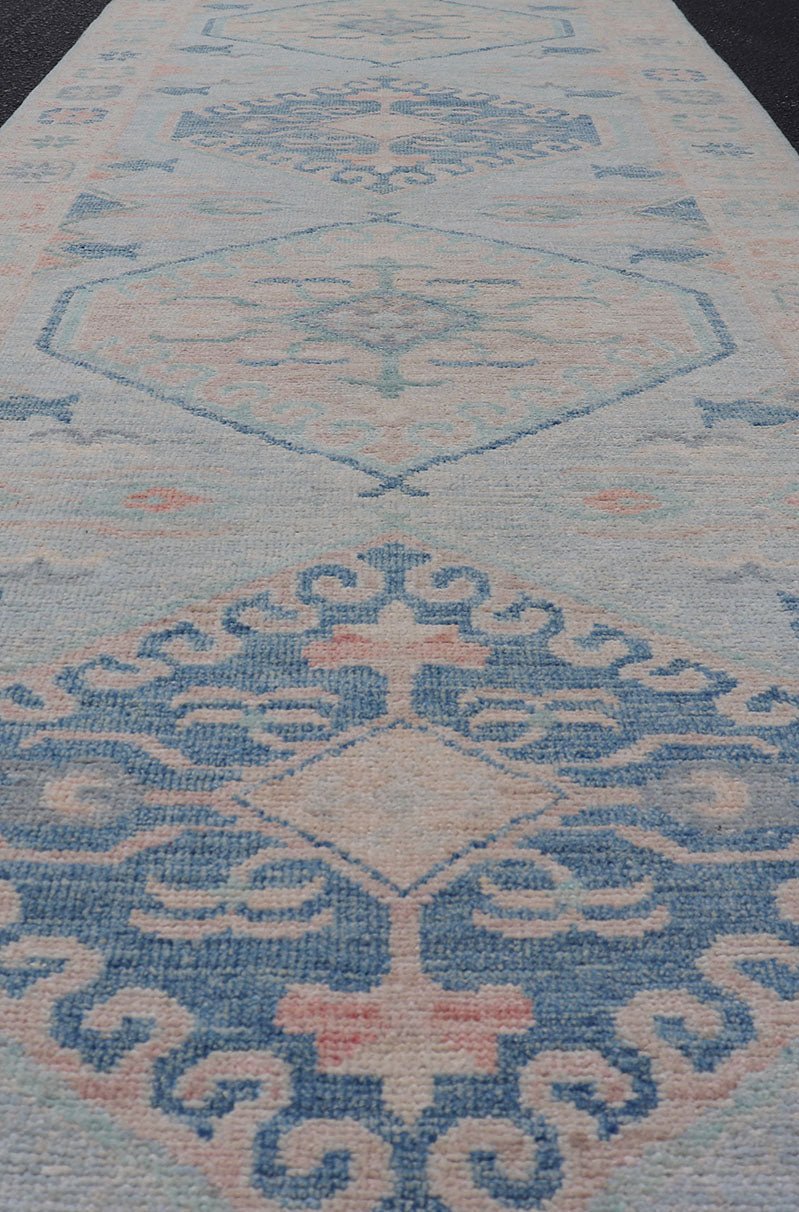 Measures: 2'10 x 9'10 Modern Oushak Medallion Design Runner With Light Blue Color With Muted Colors. Keivan Woven Arts; rug AWR - 12848 / Country of Origin: Afghanistan Type: Oushak Circa 2010 Key Words: Medallion Oushak Runner. This runner p... - Keivan Woven ArtsAWR - 12848 - 23354Rug