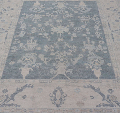 Measures: 11'10 x 14'8 Modern Sub - Geometric large Oushak Rug with Muted Tones of Blue, Gray, and Cream. Keivan Woven Arts rug AWR - 12866 Country of Origin: Afghanistan Type: Oushak Design: Geometric, Mosaic Medallion This hand - knotted Oushak fea... - Keivan Woven ArtsAWR - 12866 - 23426Rug