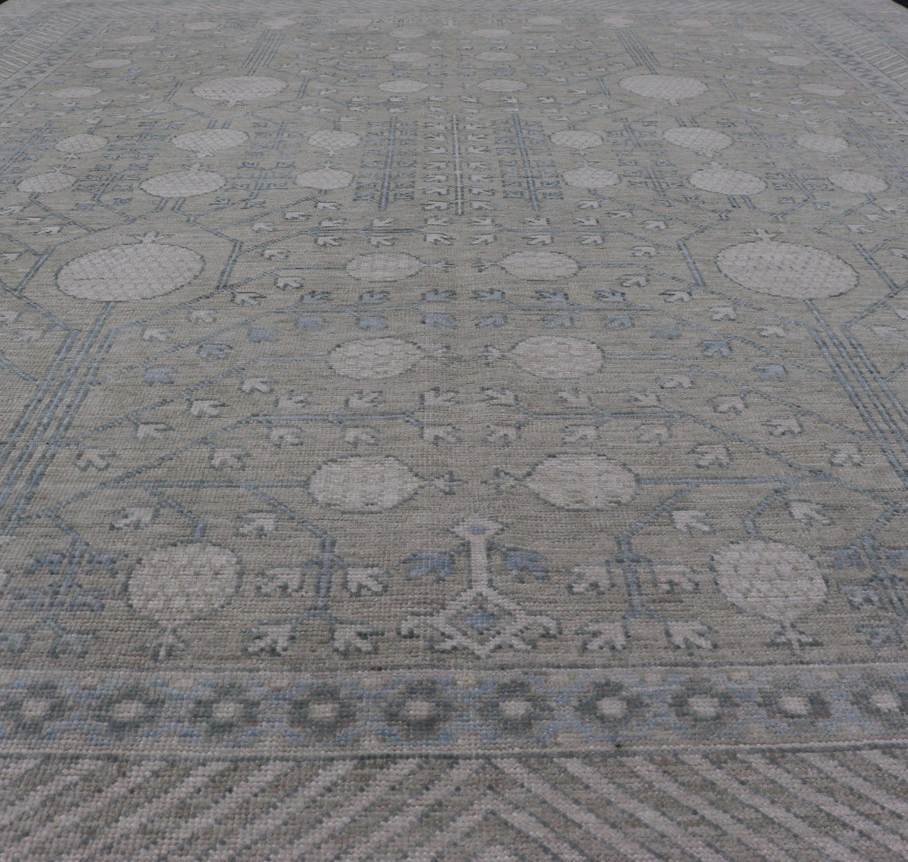 Modern Tribal Khotan Rug in Shades of Cream. Green, Blue, and Gray. Keivan Woven Arts Country of Origin; Afghanistan Type: Khotan Keivan Woven Arts; rug AWR - 15227 , Early 21st century. Measures: 8'2 x 10'4 This modern Khotan featur... - Keivan Woven ArtsAWR - 15227 - 23384