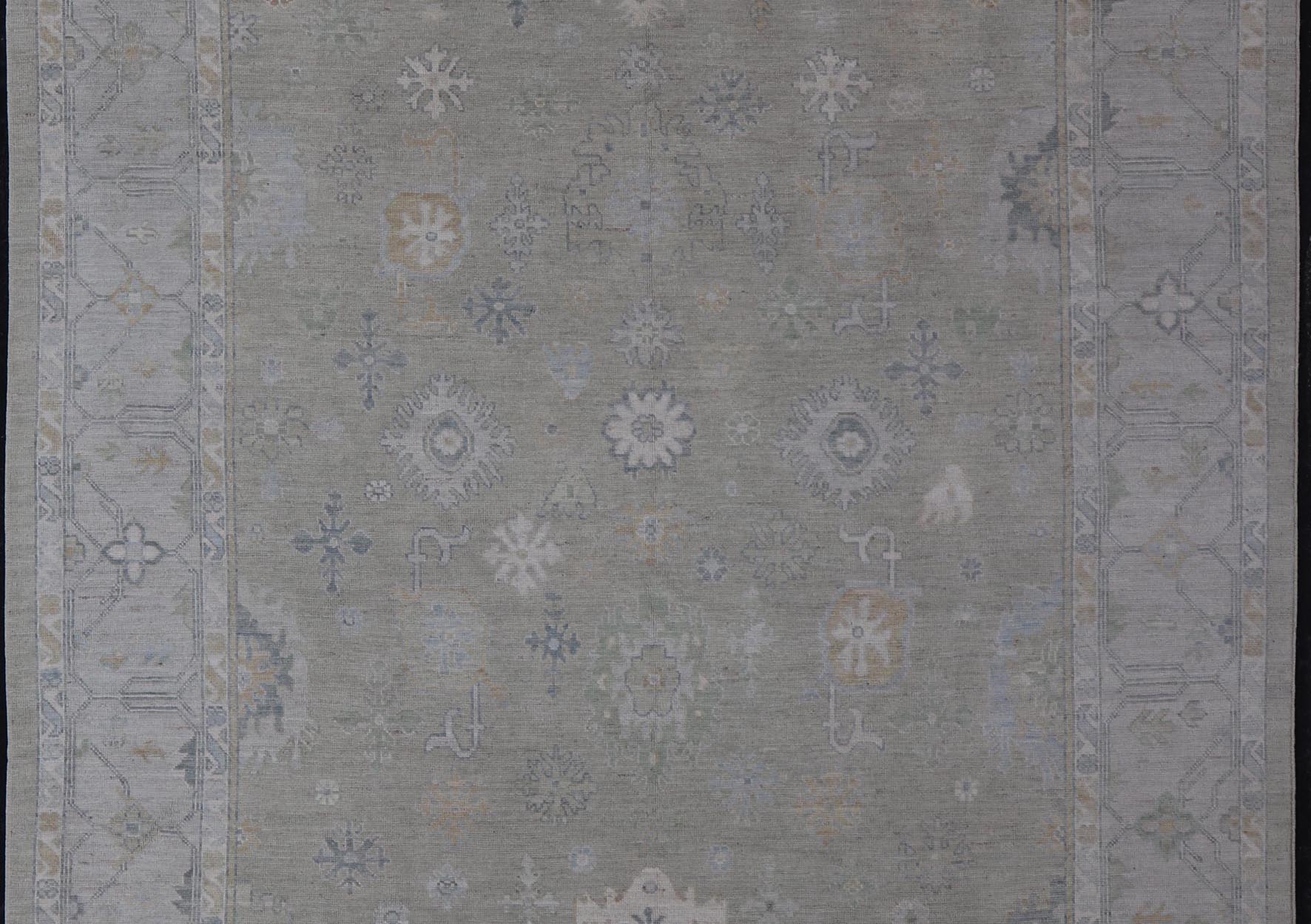 Hand - Knotted Modern Neutral Oushak Rug in Light Gray, Light Blue, Green. Keivan Woven Arts; rug AWR - 16020Country of Origin: Afghanistan Type: Oushak Design: All - Over, Floral Measures: 10.3 x 14.3 This rustic piece holds charm within a powder blu... - Keivan Woven ArtsAWR - 16020 - 24247Rug