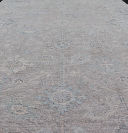 Modern Oushak with Floral Motifs with Cream, Grey, Blue, and Powder Blue. Keivan Woven Arts; rug AWR - 16034 Country of Origin: Afghanistan Type: Oushak Design: Floral, All - Over Abstract - Tribal 21st century. Measures: 6'2 x 10'0 This modern Ousha... - Keivan Woven ArtsAWR - 16034 - 24241Rug