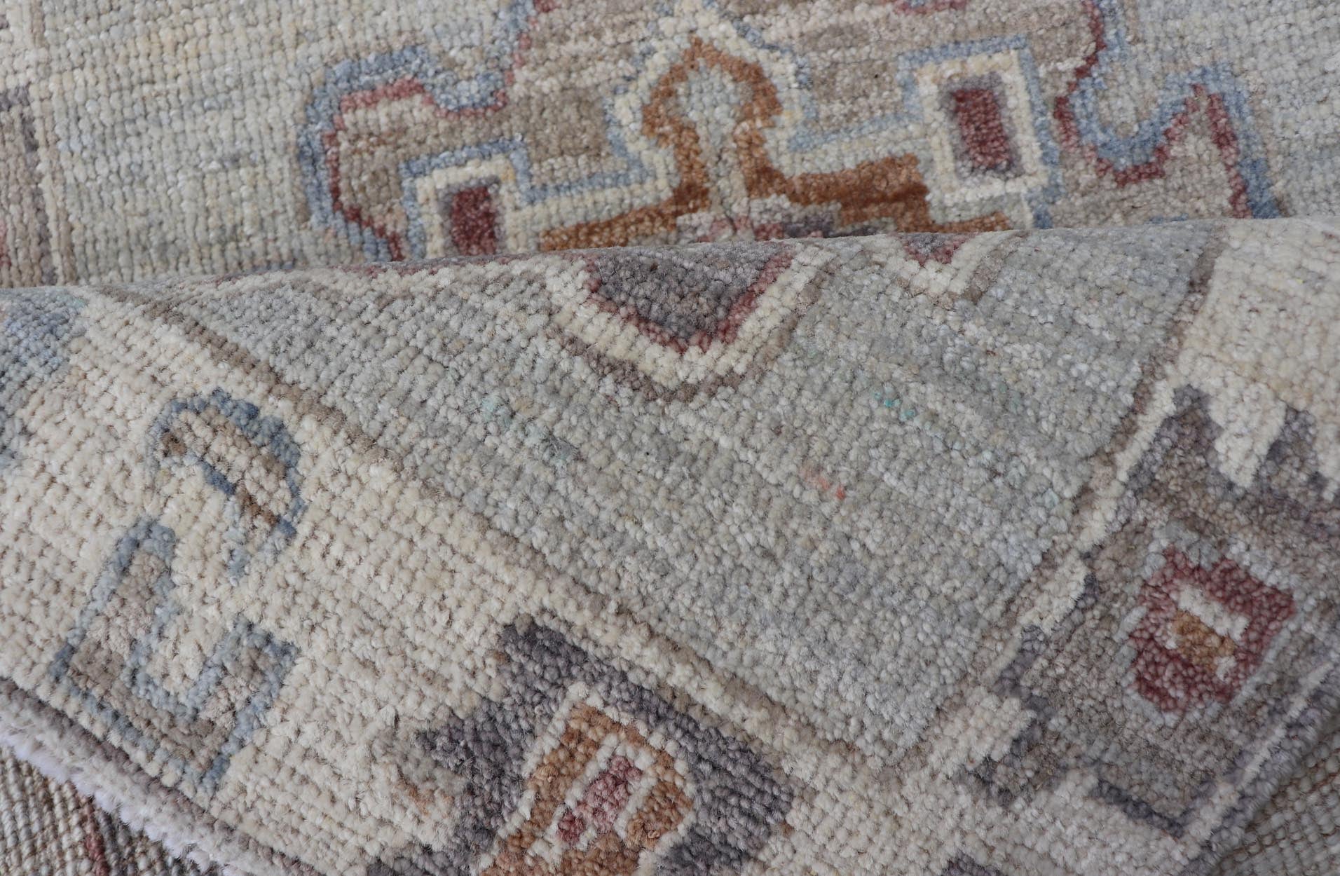 Modern Oushak Medallion Motif's on Light Grey Background and Earthy Tones. Keivan Woven Arts; rug AWR - 10644 Country of Origin: Afghanistan Type: Oushak Design. Measures: 2'0 x 3'2 The border and field are covered in floral - like motifs filled wit... - Keivan Woven ArtsAWR - 16044 - 24229Rug