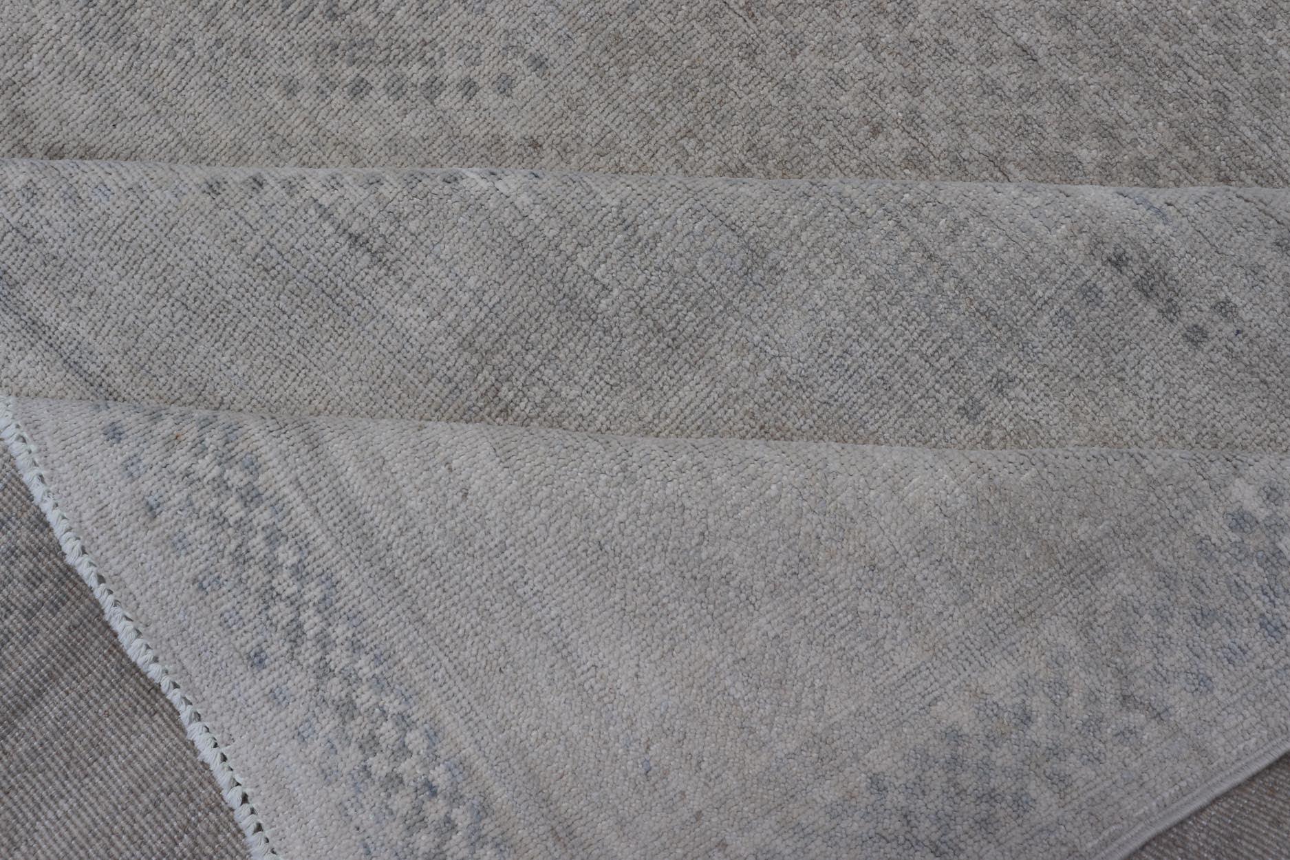 Contemporary Khotan with Medallions in Light Colors With All - Over Tribal Motifs. Keivan Woven Arts: rug AWR - 16718. 21st Century. This Khotan Design rug, Country of Origin: Afghanistan; Type: Khotan; Design: Samarkand, Tribal Design with Circular Medall... - Keivan Woven ArtsAWR - 16718 - 24438Rug