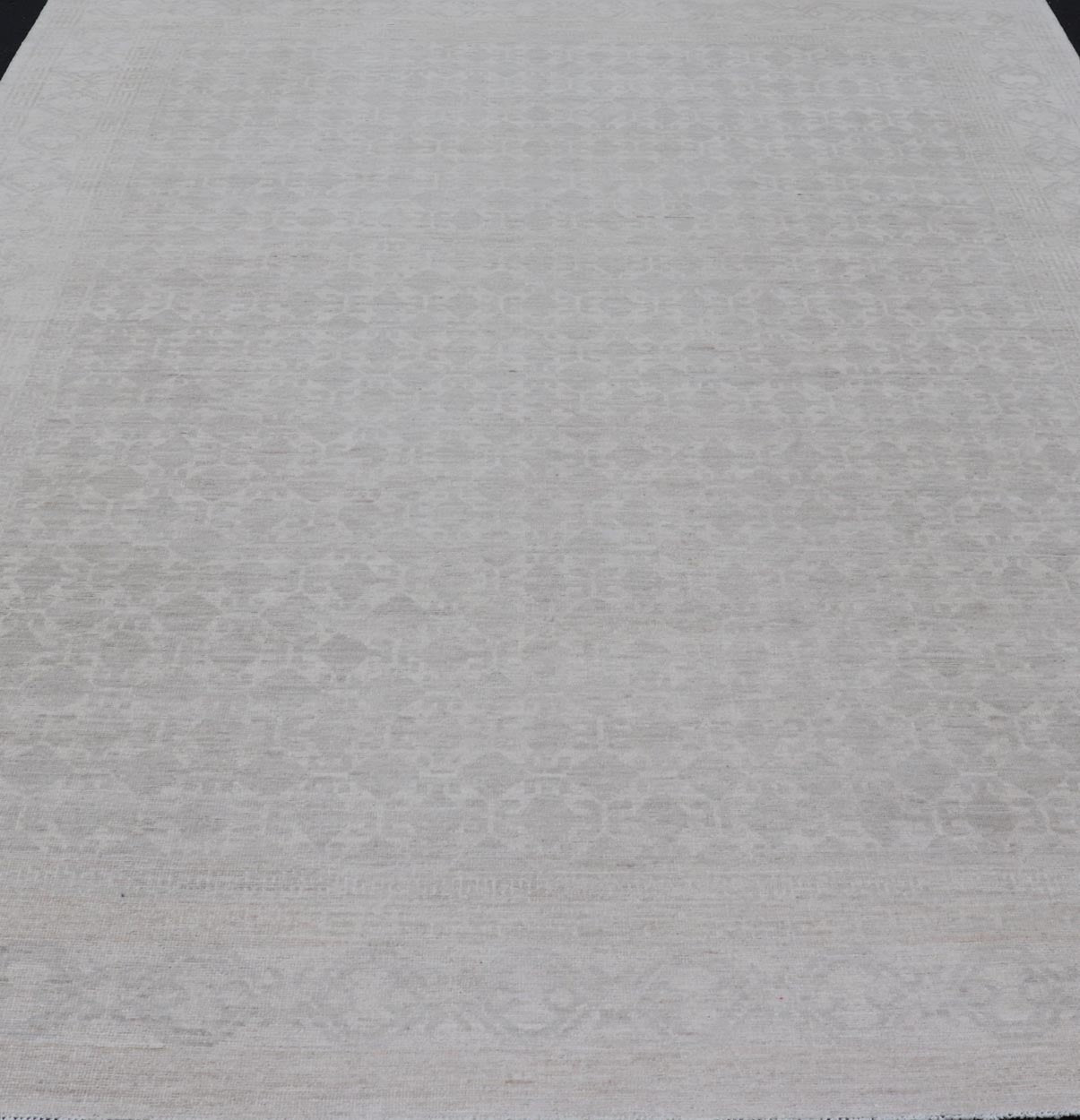 Modern All - Over Tribal Motif Khotan Area Rug in Muted Gray and Cream Tones. Country of Origin: Afghanistan; Type: Khotan; Design: Floral, All - Over; Keivan Woven Arts: rug/AWR - 16720. Measures: 8'11 x 12'3 This modern Khotan features a modern mut... - Keivan Woven ArtsAWR - 16720 - 24300