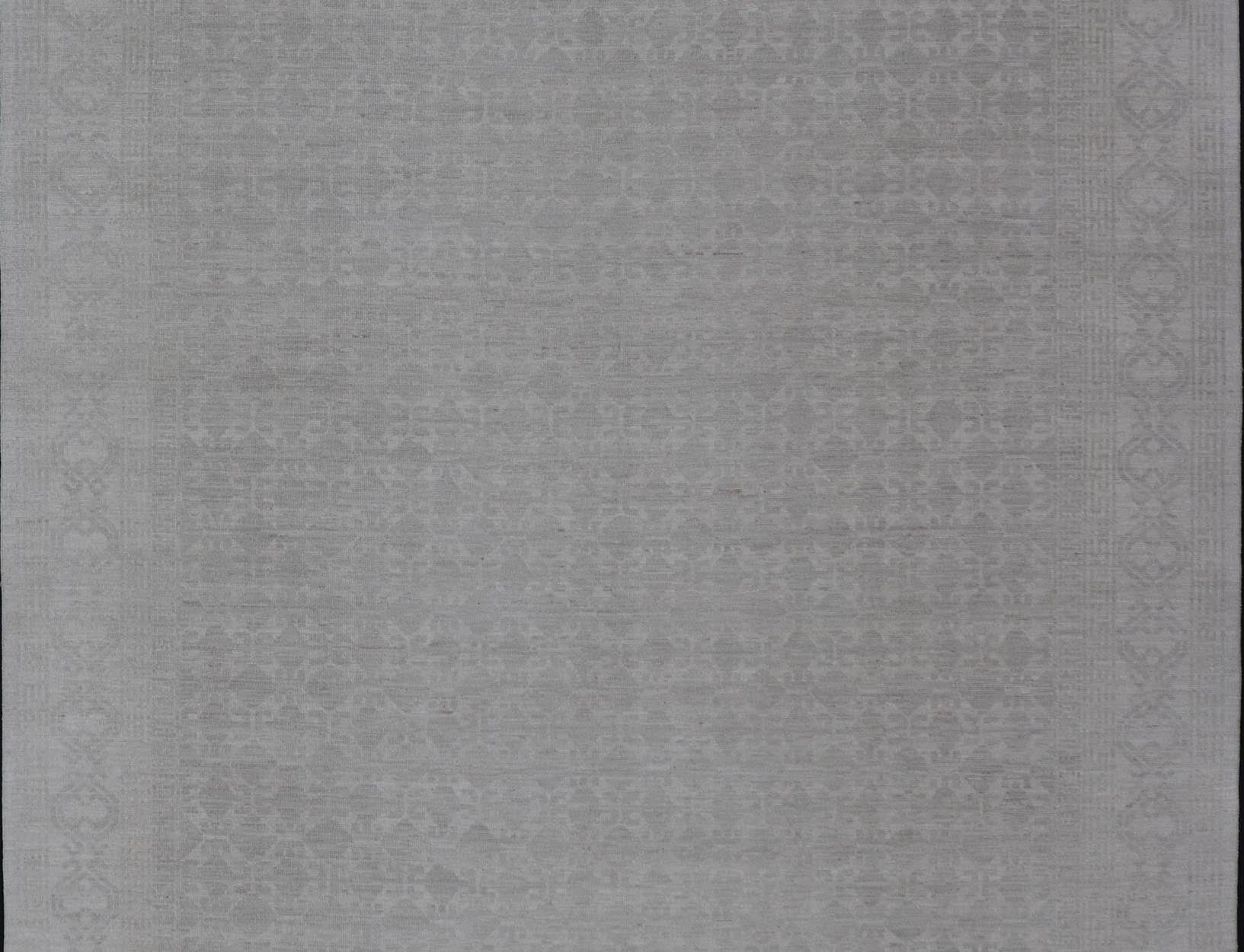 Modern All - Over Tribal Motif Khotan Area Rug in Muted Gray and Cream Tones. Country of Origin: Afghanistan; Type: Khotan; Design: Floral, All - Over; Keivan Woven Arts: rug/AWR - 16720. Measures: 8'11 x 12'3 This modern Khotan features a modern mut... - Keivan Woven ArtsAWR - 16720 - 24300