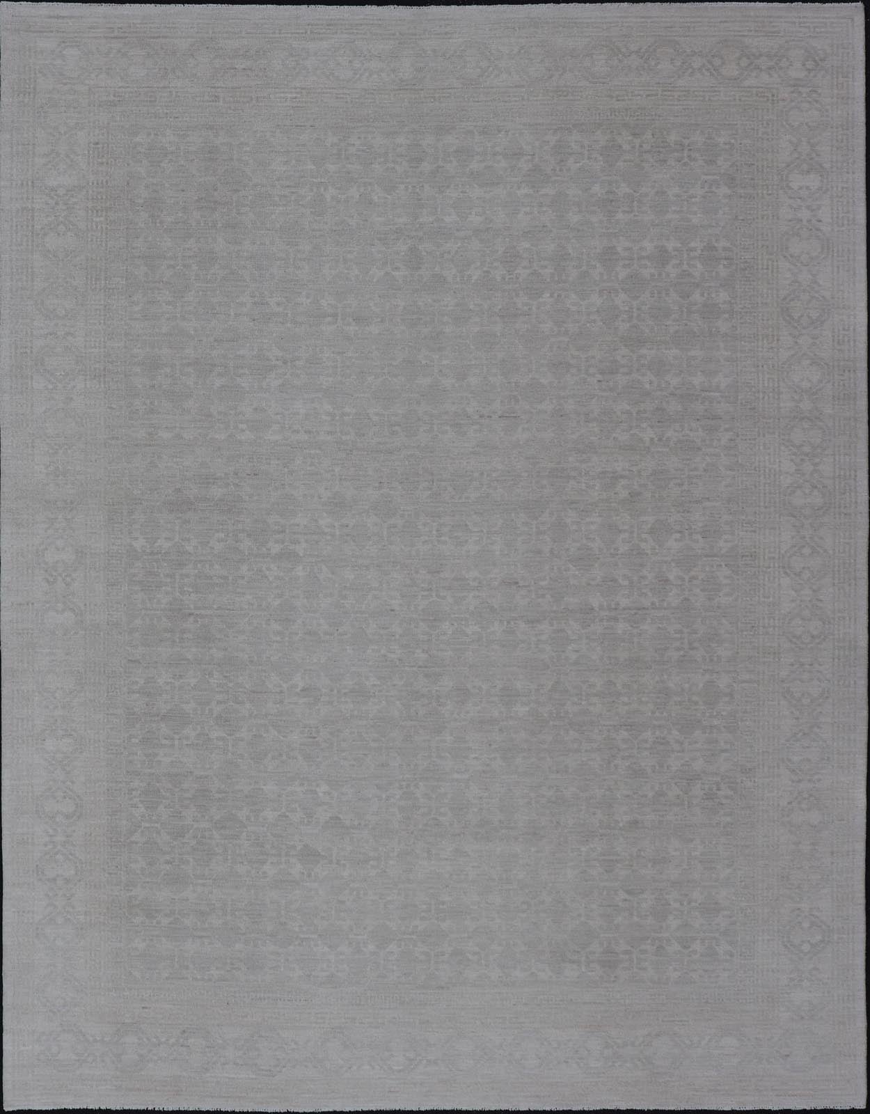 Modern All - Over Tribal Motif Khotan Area Rug in Muted Gray and Cream Tones. Country of Origin: Afghanistan; Type: Khotan; Design: Floral, All - Over; Keivan Woven Arts: rug/AWR - 16720. Measures: 8'11 x 12'3 This modern Khotan features a modern mut... - Keivan Woven ArtsAWR - 16720 - 24300
