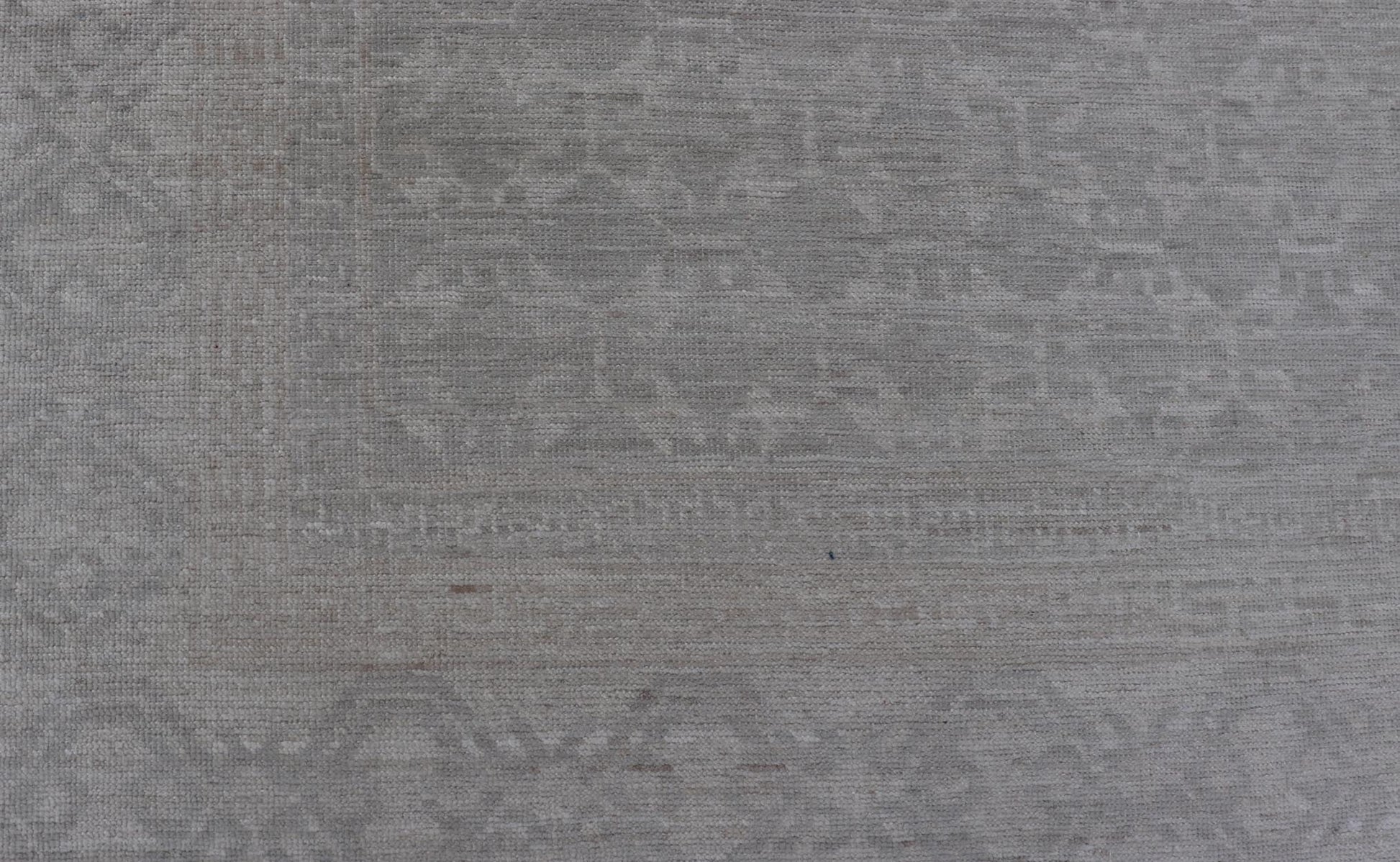 Modern All - Over Tribal Motif Khotan Area Rug in Muted Gray and Cream Tones. Country of Origin: Afghanistan; Type: Khotan; Design: Floral, All - Over; Keivan Woven Arts: rug/AWR - 16720. Measures: 8'11 x 12'3 This modern Khotan features a modern mut... - Keivan Woven ArtsAWR - 16720 - 24300
