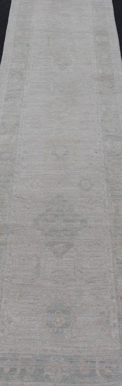 Hand - Knotted Oushak Runner with Medallion Design On A Cream Field With Blues. Keivan Woven Arts; rug AWR - 16727 Country of Origin: Afghanistan Type: Oushak Design: Medallion, Motif, Floral Motif. Measures: 2'8 x 11'10 This modern Oushak which ar... - Keivan Woven ArtsAWR - 16727 - 24294Rug