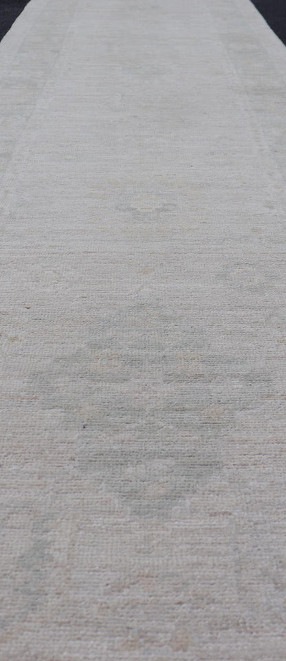Hand - Knotted Oushak Runner with Medallion Design On A Cream Field With Blues. Keivan Woven Arts; rug AWR - 16727 Country of Origin: Afghanistan Type: Oushak Design: Medallion, Motif, Floral Motif. Measures: 2'8 x 11'10 This modern Oushak which ar... - Keivan Woven ArtsAWR - 16727 - 24294Rug