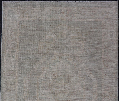 Modern Oushak with Off Gray Background with A Large Tribal Medallion in Cream. Country of Origin: Afghanistan; Type: Oushak; Design: Medallion, Tribal Medallion, All - Over; Keivan Woven Arts: rug AWR - 16772. 21st Century. Measures: 2'8 x 4'3 This... - Keivan Woven ArtsAWR - 16772 - 24444Rug