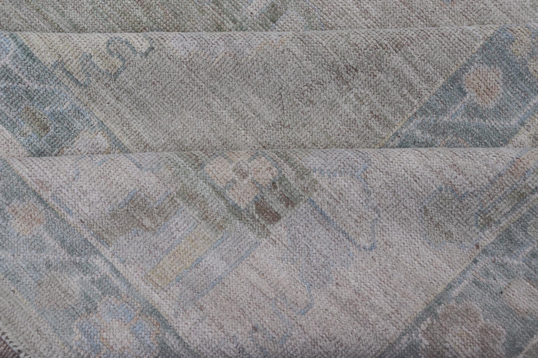 Measures: 12'0 x 15'0 Modern Oushak with Floral Motifs & Muted Colorful Tones on Neutral Background. Keivan Woven Arts; rug AWR - 8347 Country of Origin: Afghanistan Type: Oushak Design. This large Oushak has a border and background that are c... - Keivan Woven ArtsAWR - 16852 - 24970Rug