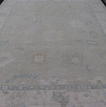 Measures: 12'0 x 15'0 Modern Oushak with Floral Motifs & Muted Colorful Tones on Neutral Background. Keivan Woven Arts; rug AWR - 8347 Country of Origin: Afghanistan Type: Oushak Design. This large Oushak has a border and background that are c... - Keivan Woven ArtsAWR - 16852 - 24970Rug