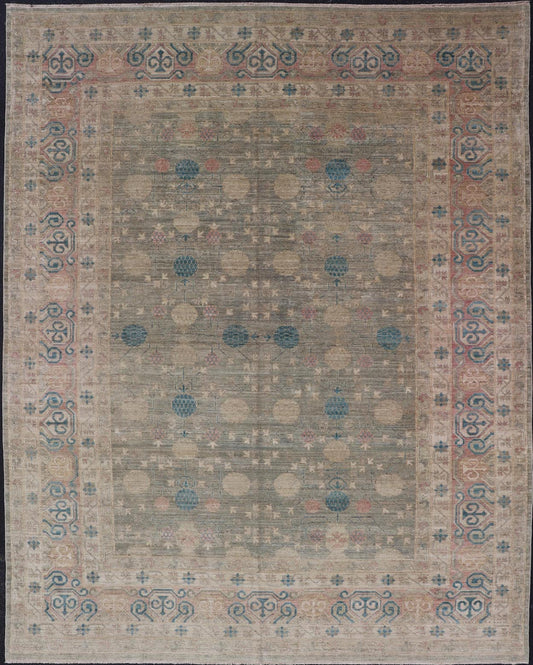 Large Modern Tribal Khotan Rug in Shades of Cream, Green, Blue, and Coral. Keivan Woven Arts Country of origin; Afghanistan Type: Khotan Keivan Woven Arts; rug AWR - 17257, early 21st century. Measures: 10'5 x 13'8 This modern Khotan features a m... - Keivan Woven ArtsAWR - 17257 - 24994