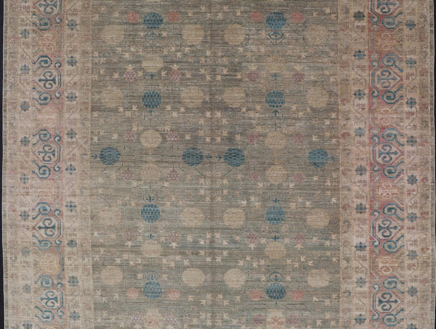 Large Modern Tribal Khotan Rug in Shades of Cream, Green, Blue, and Coral. Keivan Woven Arts Country of origin; Afghanistan Type: Khotan Keivan Woven Arts; rug AWR - 17257, early 21st century. Measures: 10'5 x 13'8 This modern Khotan features a m... - Keivan Woven ArtsAWR - 17257 - 24994Rug