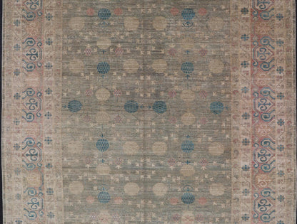 Large Modern Tribal Khotan Rug in Shades of Cream, Green, Blue, and Coral. Keivan Woven Arts Country of origin; Afghanistan Type: Khotan Keivan Woven Arts; rug AWR - 17257, early 21st century. Measures: 10'5 x 13'8 This modern Khotan features a m... - Keivan Woven ArtsAWR - 17257 - 24994Rug