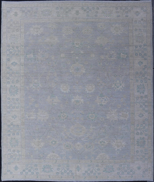 Modern Oushak with Floral Motifs with Cream, Grey, Blue, and Powder Blue. Keivan Woven Arts; rug AWR - 17319 Country of Origin: Afghanistan Type: Oushak Design: Floral, All - Over Abstract - Tribal 21st century. Measures: 9'3 x 11'8 This modern Ousha... - Keivan Woven ArtsAWR - 17319 - 25000Rugs