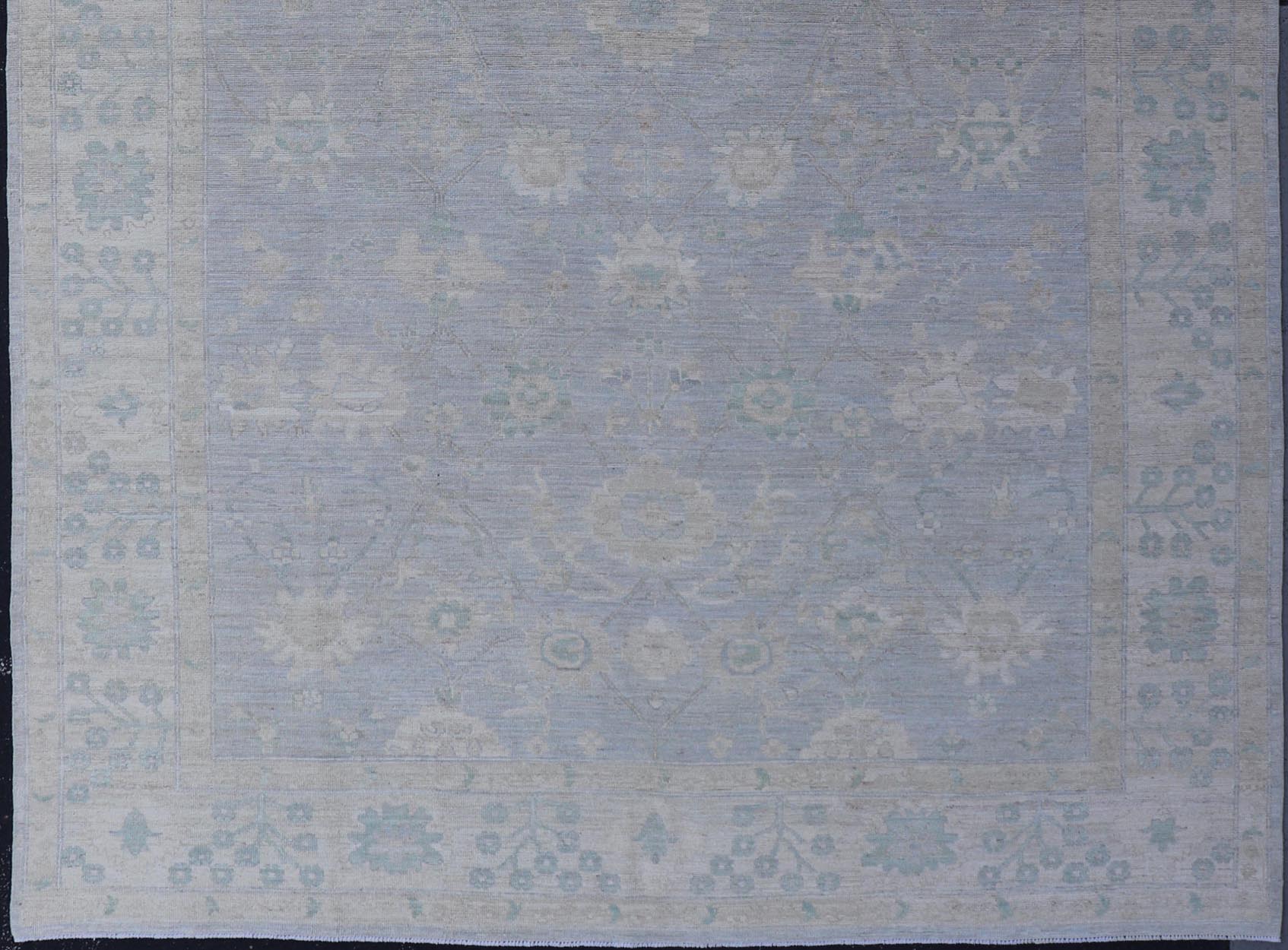 Modern Oushak with Floral Motifs with Cream, Grey, Blue, and Powder Blue. Keivan Woven Arts; rug AWR - 17319 Country of Origin: Afghanistan Type: Oushak Design: Floral, All - Over Abstract - Tribal 21st century. Measures: 9'3 x 11'8 This modern Ousha... - Keivan Woven ArtsAWR - 17319 - 25000Rug