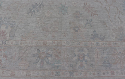 Very Large Modern Oushak with Soft Floral Motifs on Light Gray - Blue Background. Keivan Woven Arts; rug AWR - 17322 / Country of Origin: Afghanistan Type: Oushak Design: Floral. Measures: 12'1 x 17'8 This grandiose Oushak features a wide border, s... - Keivan Woven ArtsAWR - 17322 - 25006Rug