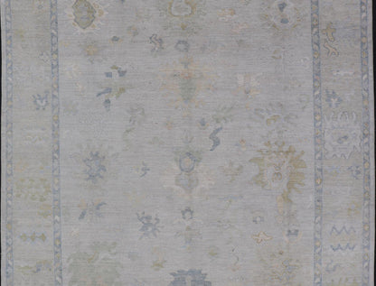 Modern Tribal Oushak with a Cream Border and Light Gray - Blue Background. Country of Origin: Afghanistan; Type: Oushak; Design: Medallion, Tribal Medallion, All - Over; Keivan Woven Arts: rug AWR - 17501. Measures: 8'0 x 10'0 A Oushak featuring all... - Keivan Woven ArtsAWR - 17501 - 24910Rug