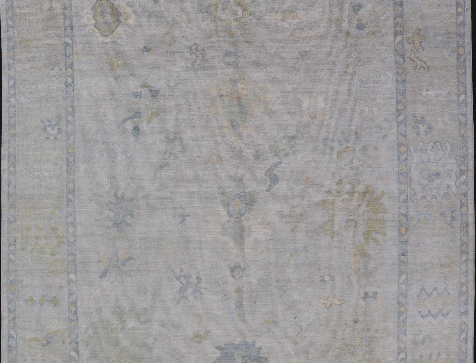 Modern Tribal Oushak with a Cream Border and Light Gray - Blue Background. Country of Origin: Afghanistan; Type: Oushak; Design: Medallion, Tribal Medallion, All - Over; Keivan Woven Arts: rug AWR - 17501. Measures: 8'0 x 10'0 A Oushak featuring all... - Keivan Woven ArtsAWR - 17501 - 24910