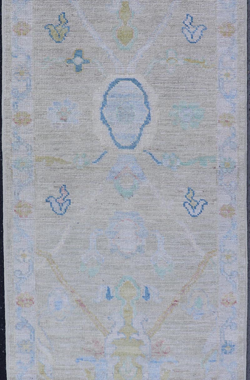 Small Modern Oushak Runner with Light Tan Background and Floral Motif With Blue. Keivan Woven Arts; rug AWR - 17514 Country of Origin: Afghanistan Type: Oushak Circa 2010 Key Words: Modern, Oushak Runner. Measures: 2'3 x 6'5 This contemporary run... - Keivan Woven ArtsAWR - 17514 - 25018Rug