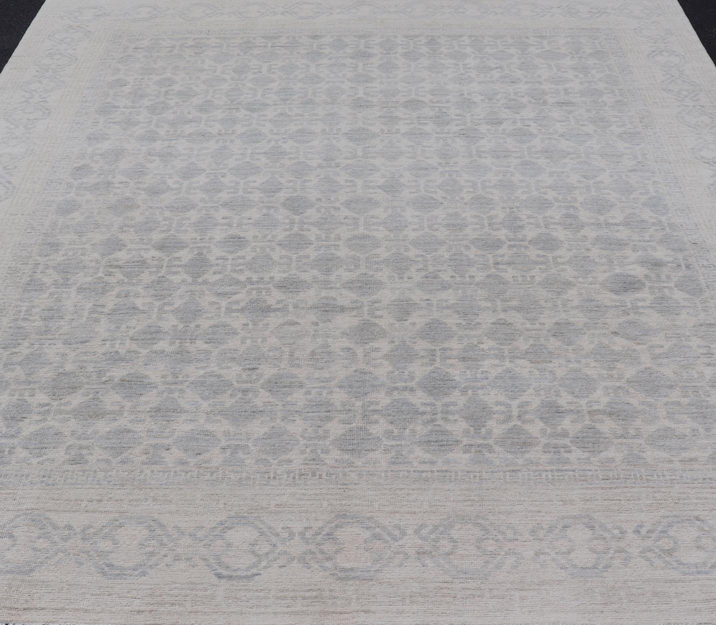 Modern All - Over Tribal Motif Khotan Area Rug in Muted Gray's and Cream. Country of Origin: Afghanistan; Type: Khotan; Design: Floral, All - Over; Keivan Woven Arts: rug/AWR - 17589. Measures: 8'0 x 10'0 This modern Khotan features a modern muted gra... - Keivan Woven ArtsAWR - 17589 - 25036