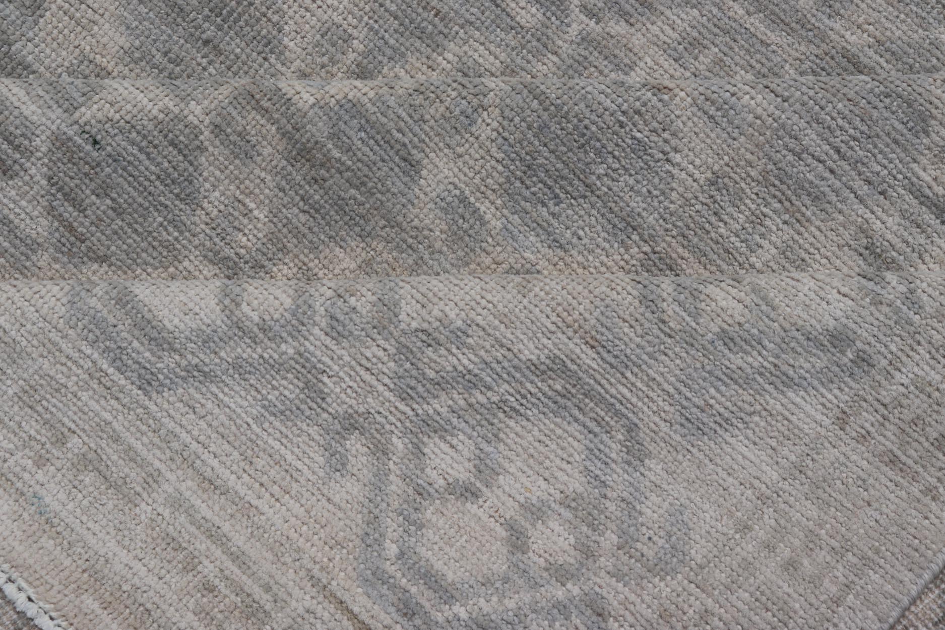 Modern All - Over Tribal Motif Khotan Area Rug in Muted Gray's and Cream. Country of Origin: Afghanistan; Type: Khotan; Design: Floral, All - Over; Keivan Woven Arts: rug/AWR - 17589. Measures: 8'0 x 10'0 This modern Khotan features a modern muted gra... - Keivan Woven ArtsAWR - 17589 - 25036