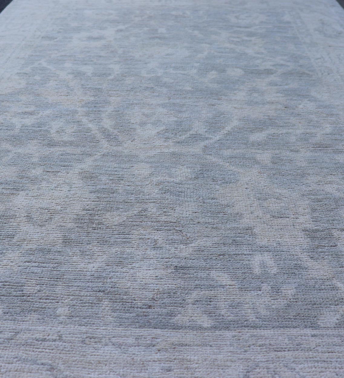 Modern Tribal Oushak with a Cream Border and Light Gray - Green Background. Keivan Woven Arts: rug / AWR - 17770 / Country of Origin: Afghanistan; Type: Oushak; Design: Medallion, Tribal Medallion, All - Over. Measures: 3'10 x 6'0 A Oushak featuring... - Keivan Woven ArtsAWR - 17770 - 25054Rug