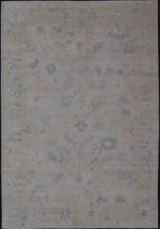 Large Oushak Rug with Floral Motifs & Muted Colorful Tones on Neutral Background. Large Oushak Rug with Floral Motifs & Muted Colorful Tones by Keivan Woven Arts. Keivan Woven Arts; rug AWR - 17857 Country of Origin: Afghanistan Type: Oushak Desi... - Keivan Woven ArtsAWR - 17857 - 25066Rugs